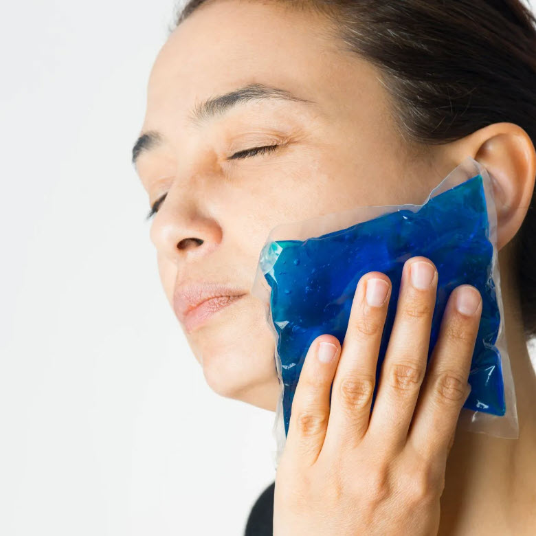 Apply a cold compress for dental pain
